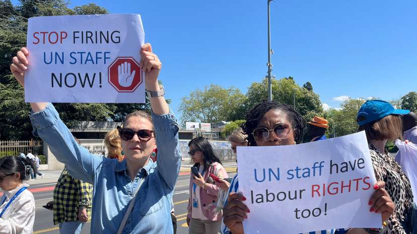 UN staff demonstrate about firing employees, outside the European headquarters, in Geneva