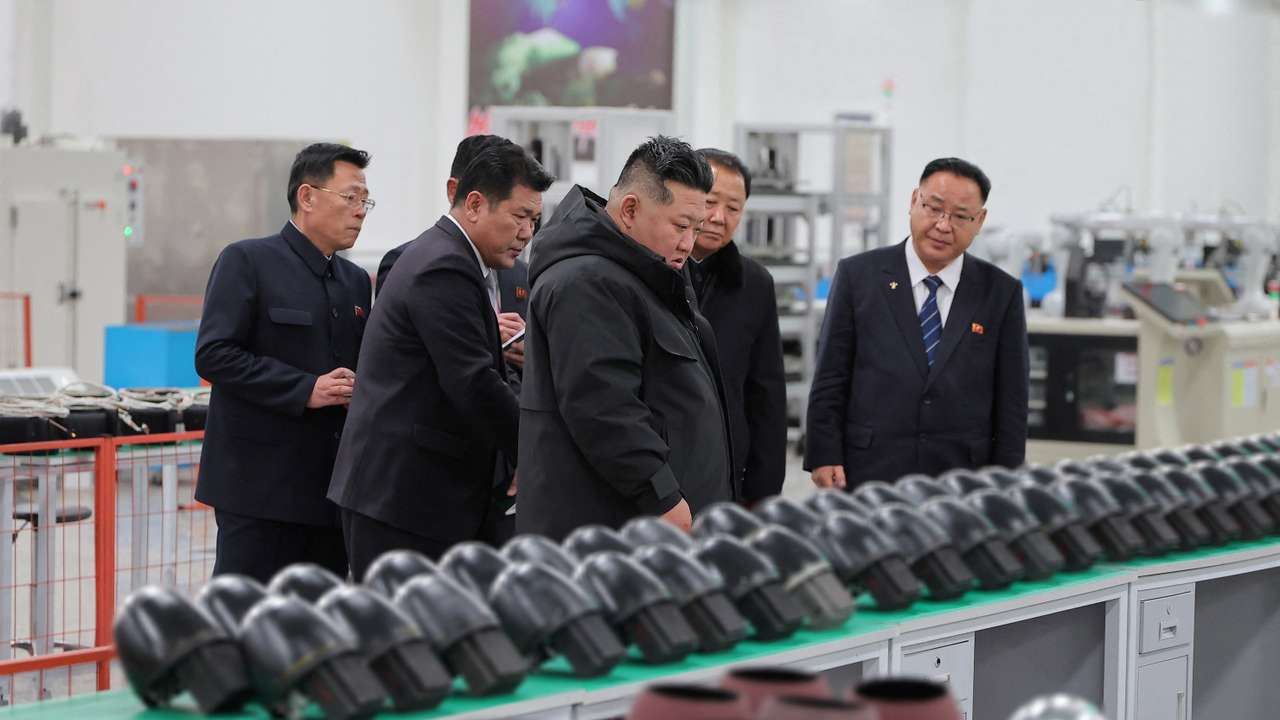 North Korean leader Kim Jong Un visits a military factory
