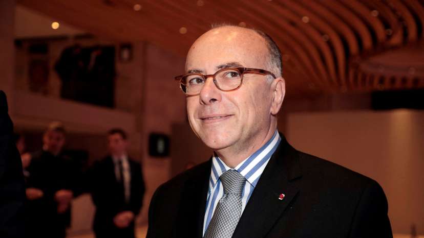 FILE PHOTO: Former French Prime Minister Bernard Cazeneuve arrives for the 34th annual dinner of the CRIF in Paris