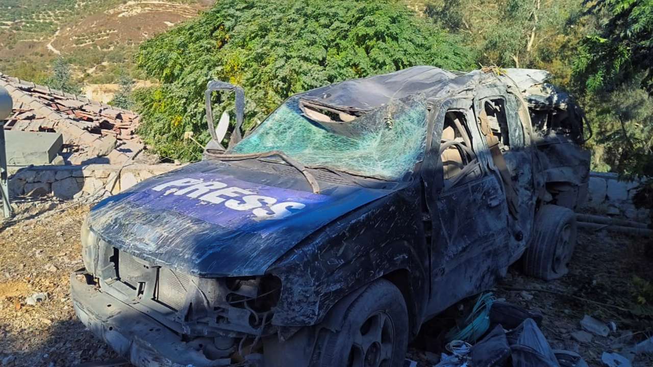 A view shows a damaged Press vehicle in Hasbaya