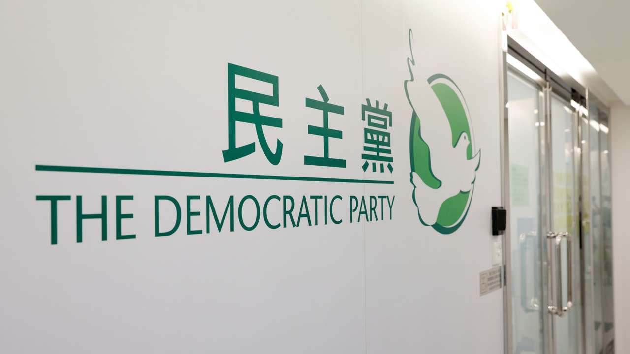 The logo of the Democratic Party is seen in its office, in Hong Kong