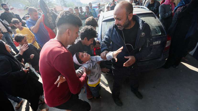 Wounded Palestinians rushed into hospital following Israeli strikes