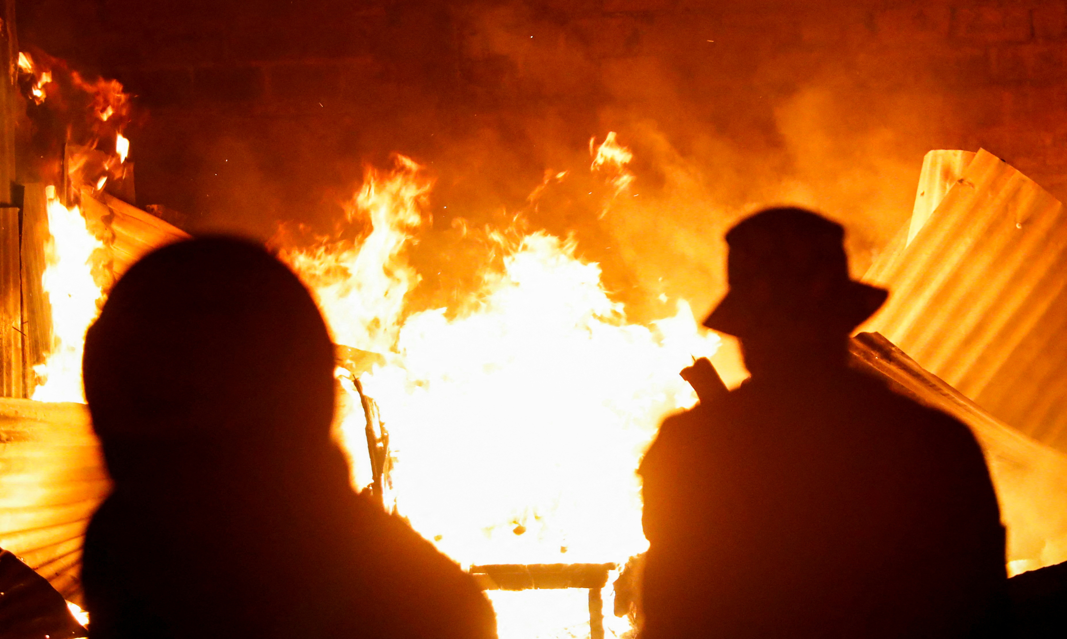 Fire following an explosion at a makeshift gas cylinder refilling depot at Mradi estate in Embakasi district of Nairobi