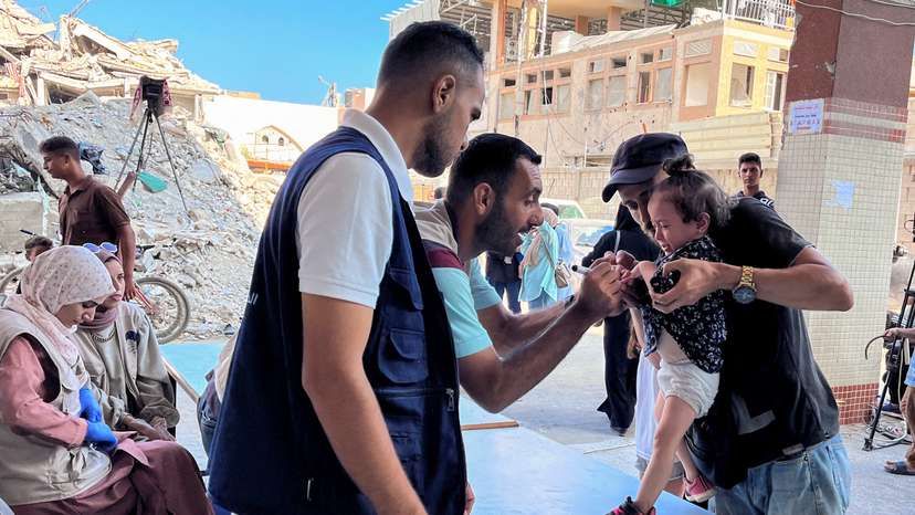 Palestinian children are vaccinated against polio, in Deir Al-Balah in the central Gaza Strip