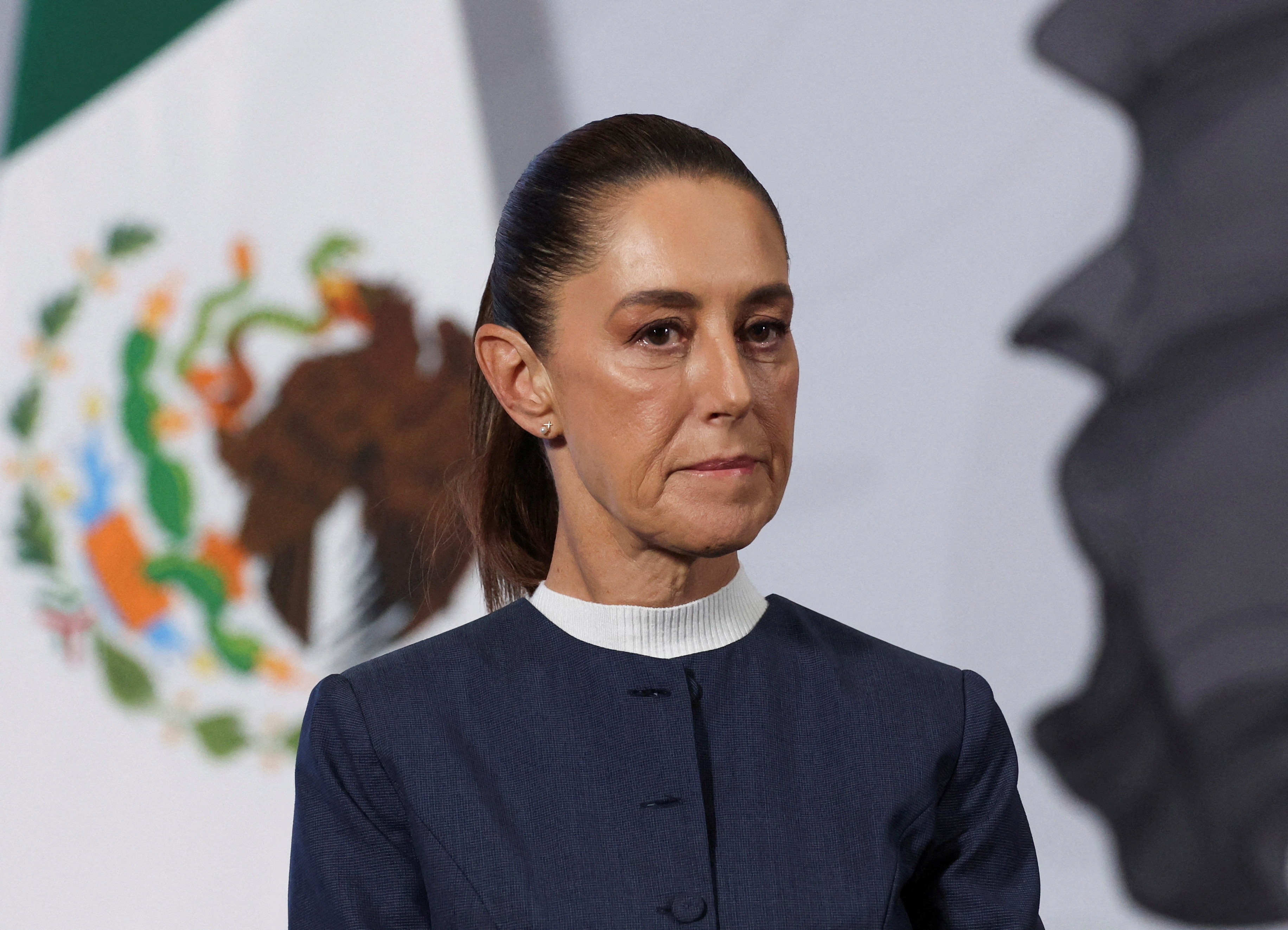FILE PHOTO: Mexico's President Claudia Sheinbaum holds a press conference at the National Palace, in Mexico City