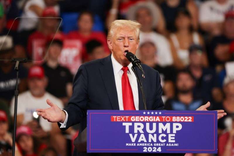 Republican presidential nominee and former U.S. President Donald Trump and his running mate JD Vance hold a campaign rally in Atlanta, Georgia