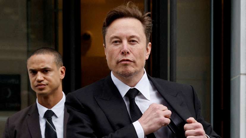 FILE PHOTO: Tesla CEO Musk departs the company’s local office in Washington