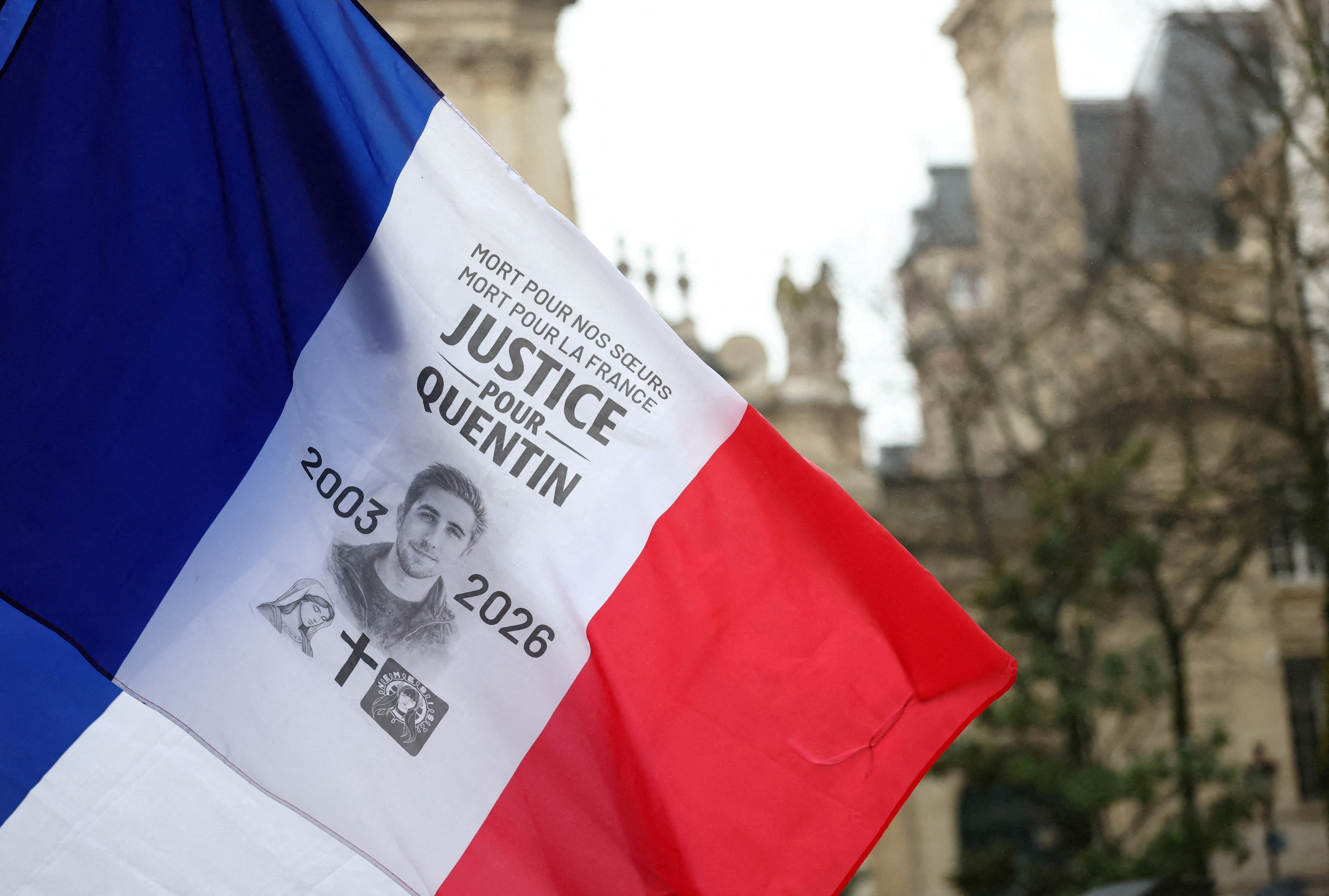 FILE PHOTO: People gather to pay tribute to Quentin, an activist who died from injuries sustained during a beating, during a demonstration in Paris