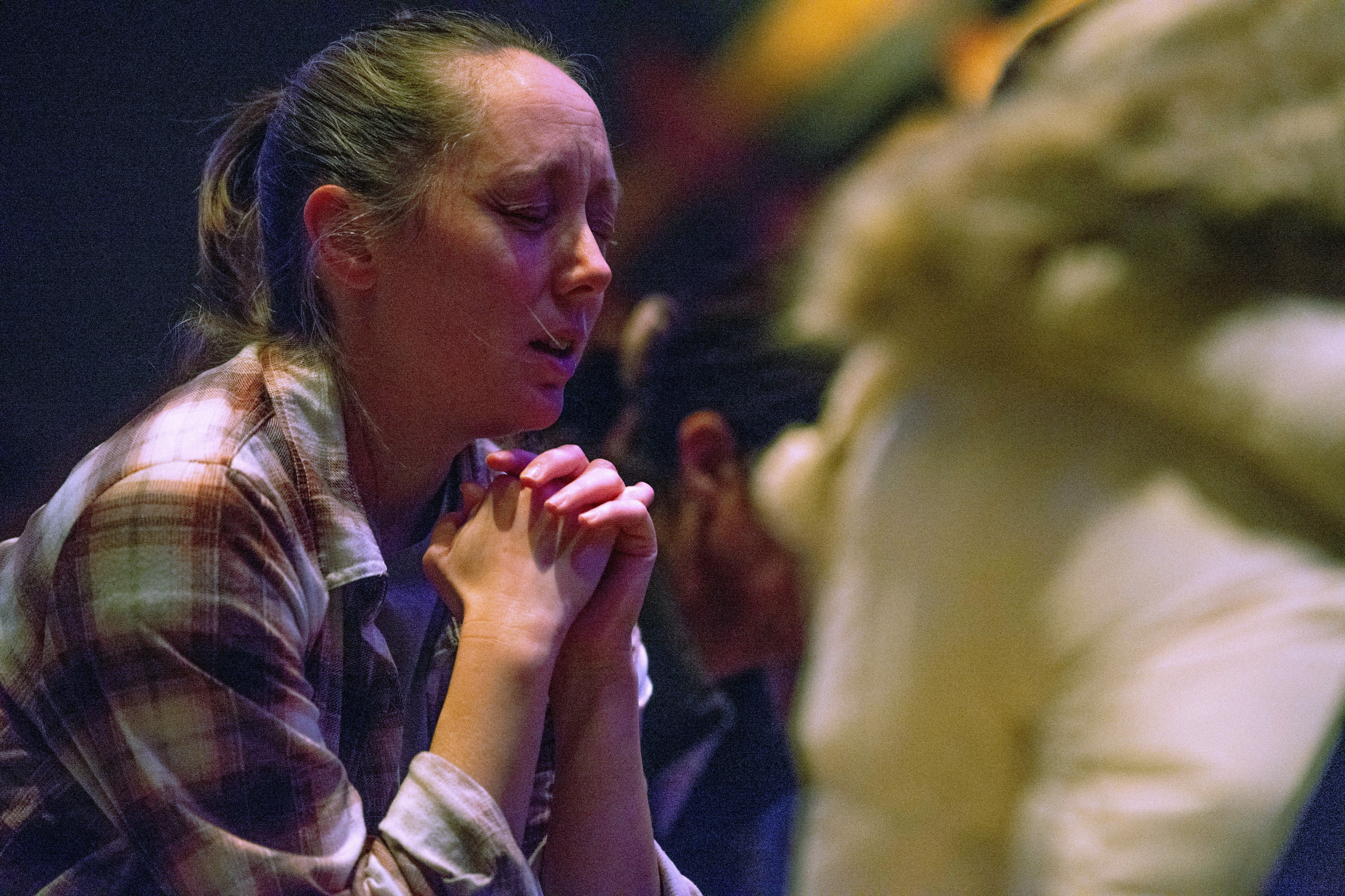 Worshipers at Blackhawk Church gather to pray for victims and survivors of a shooting in Madison