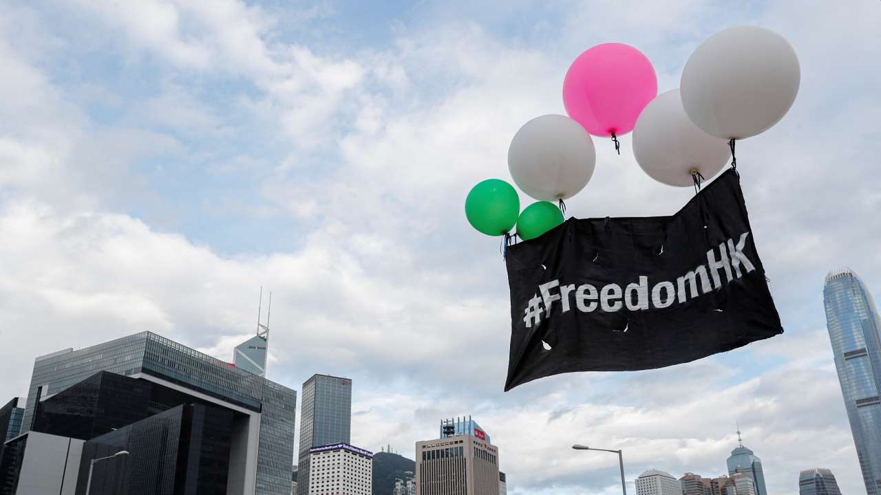 Balloons with protest slogans are seen outside the Legislative Council building during the anniversary of Hong Kong's handover to China in Hong Kong