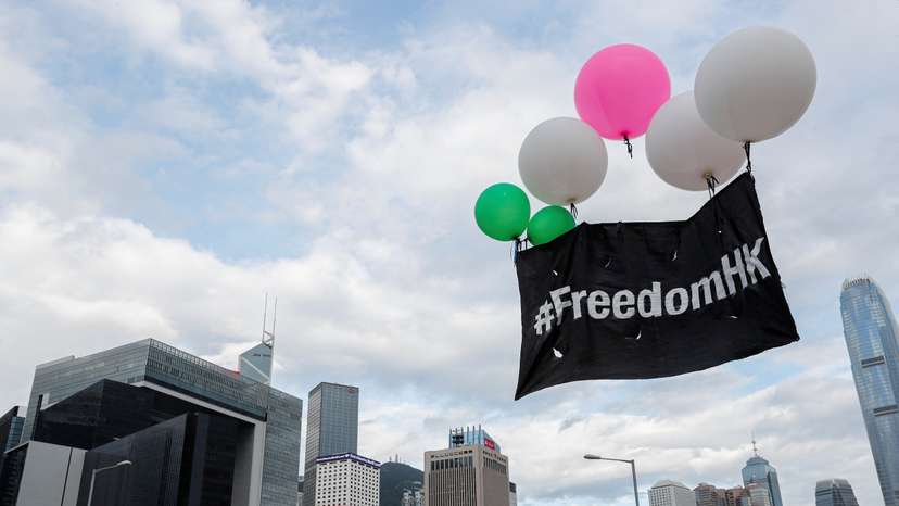 Balloons with protest slogans are seen outside the Legislative Council building during the anniversary of Hong Kong's handover to China in Hong Kong