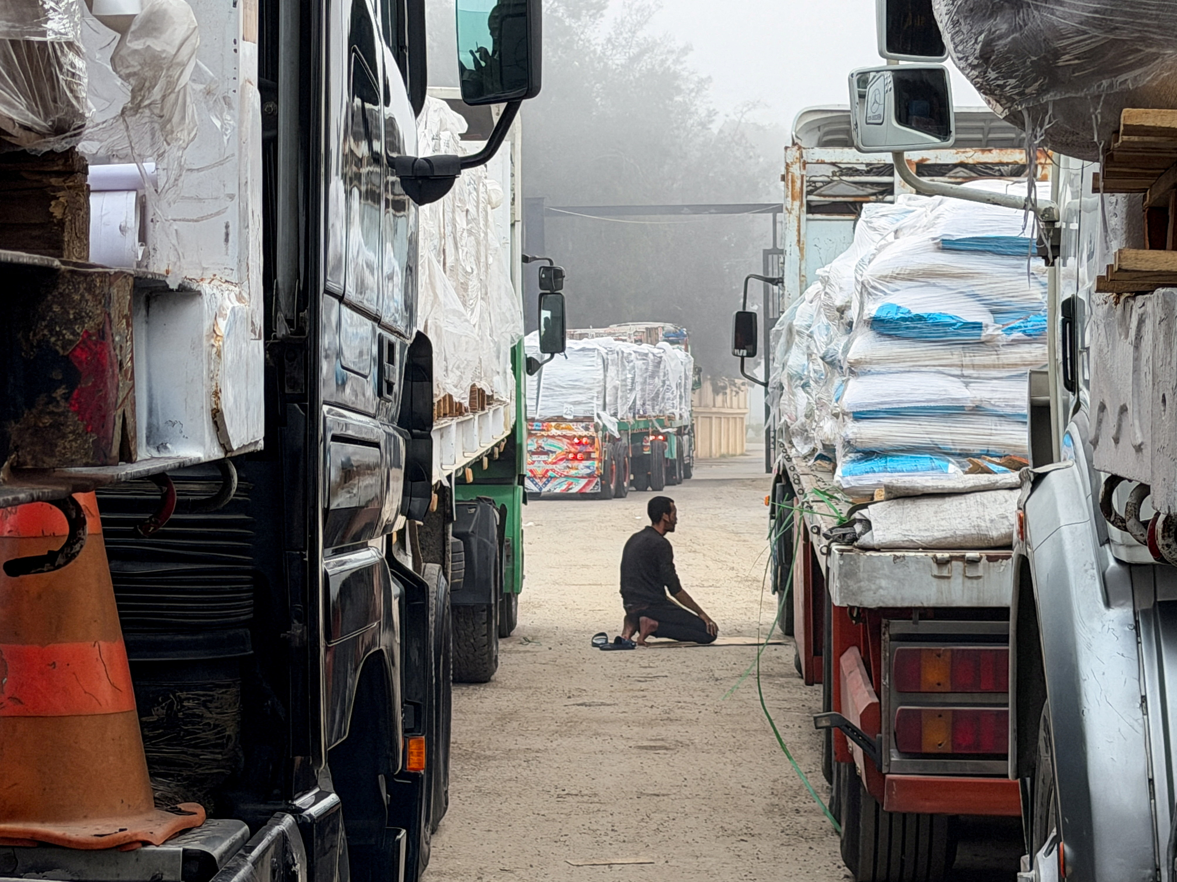 FILE PHOTO: Ambulances and aid trucks bound for Gaza at Egypt's Rafah crossing