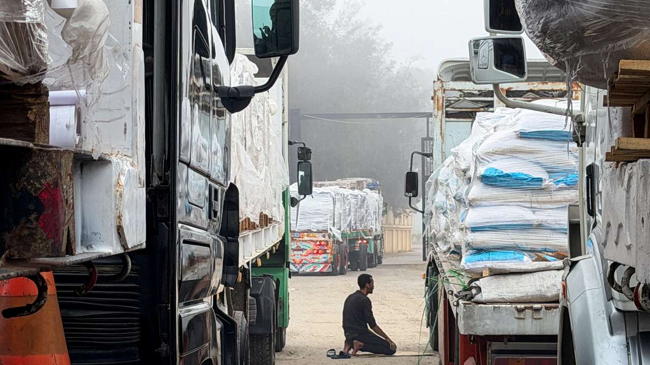 FILE PHOTO: Ambulances and aid trucks bound for Gaza at Egypt's Rafah crossing