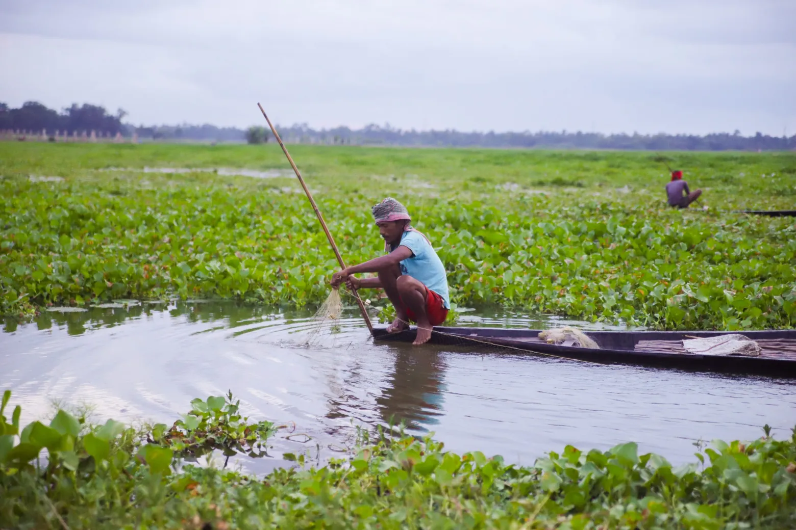 A-fisherman-in-a-pond-57725-pixahive
