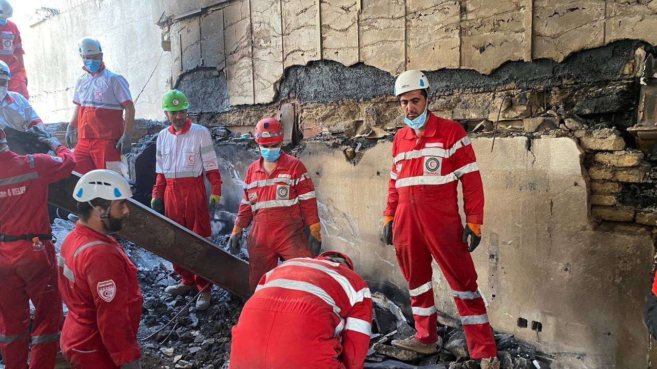 Iranian Red Crescent Society continues rescue efforts in rubble of damaged buildings