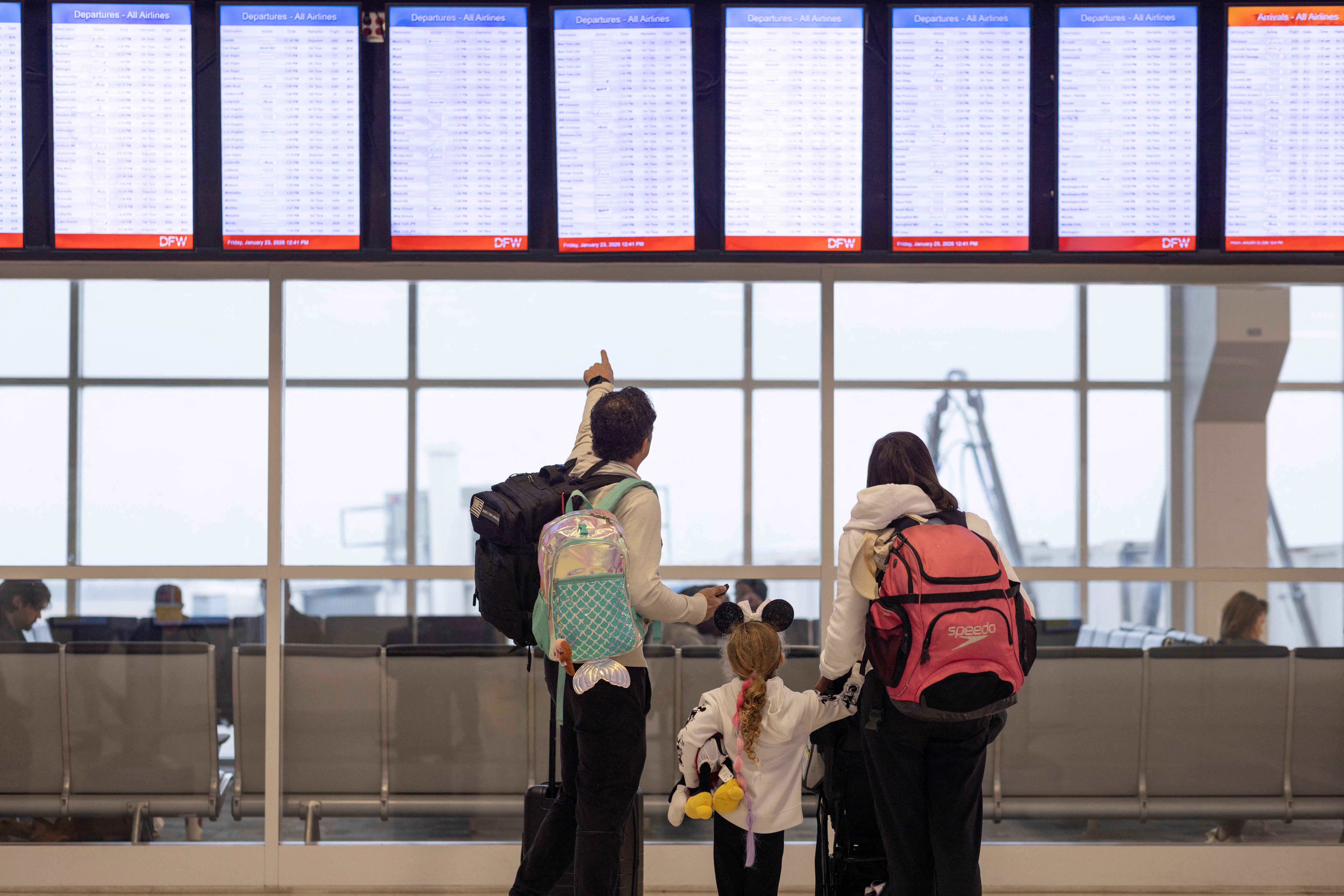Travellers at Dallas Fort Worth International Airport