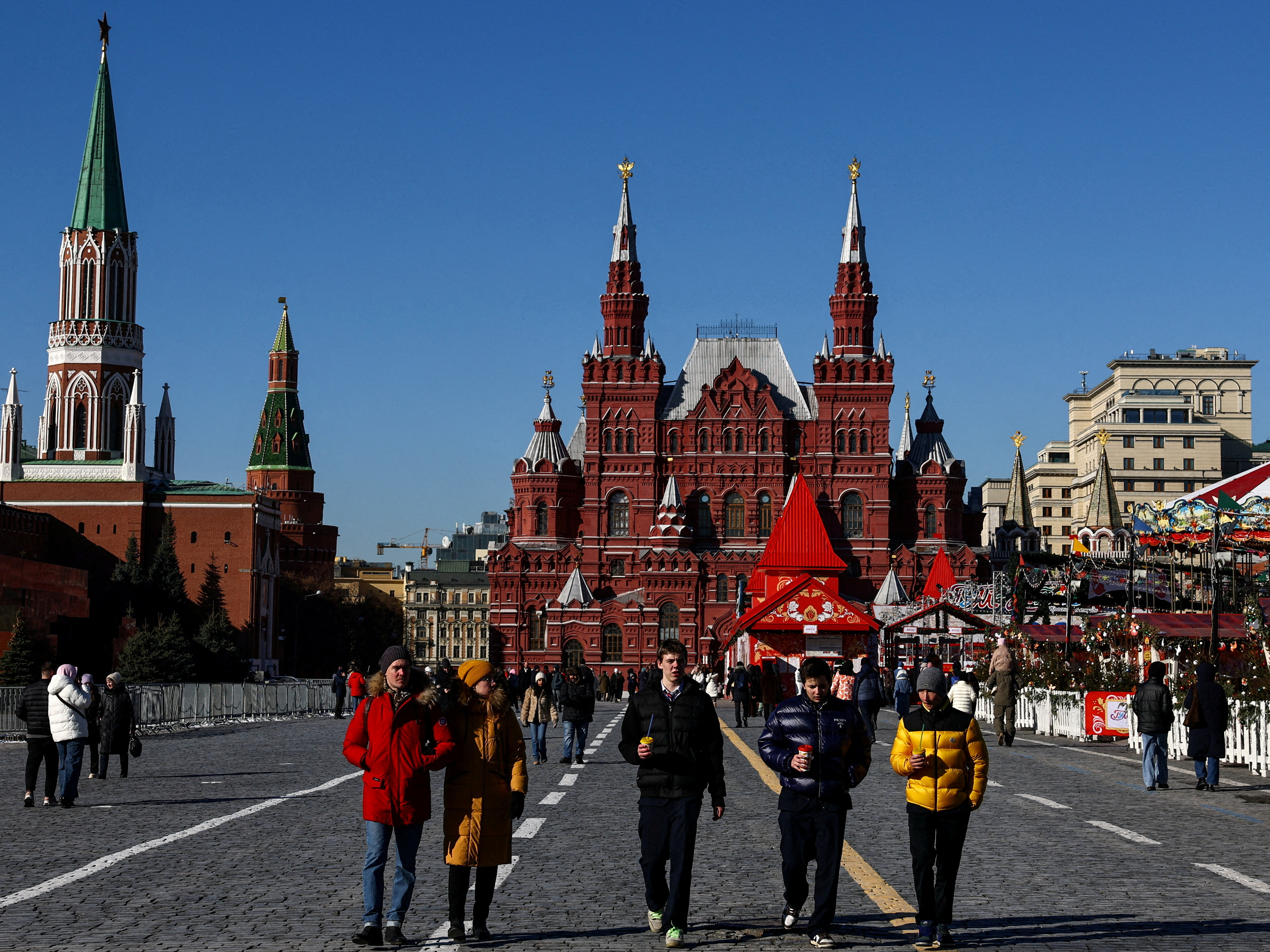 FILE PHOTO: People walk in Red Square in Moscow