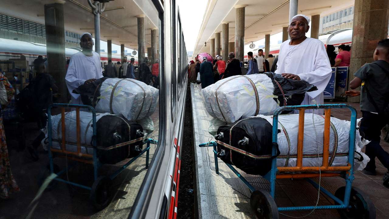 FILE PHOTO: Displaced Sudanese head home from Egypt as a free train with a voluntary return is coordinated by the Egyptian government, in Cairo