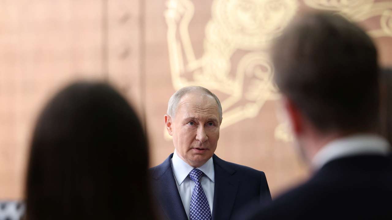 Russia's President Putin speaks with journalists in Moscow