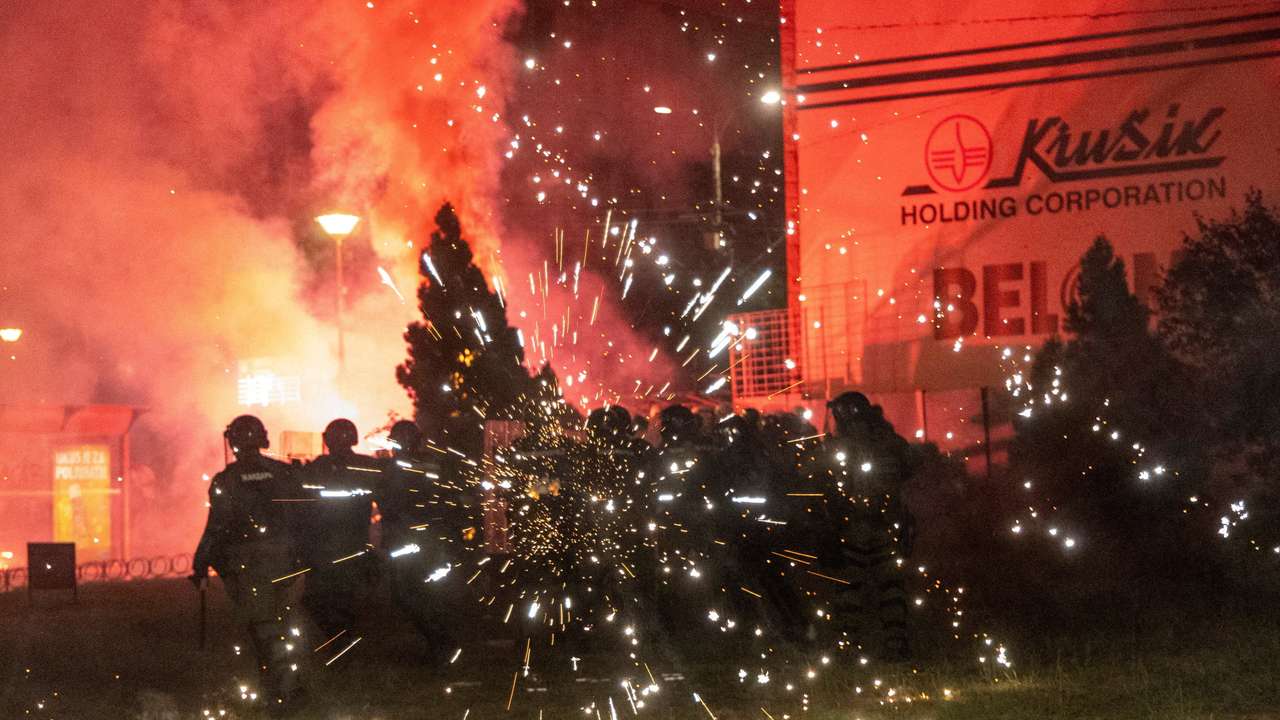 Clashes between police and anti-government protesters in Belgrade