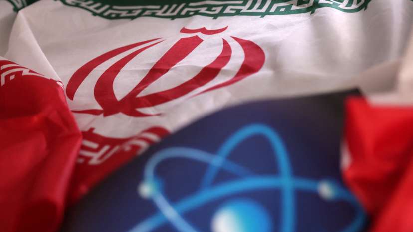 Illustration shows atomic symbol and Iranian flag