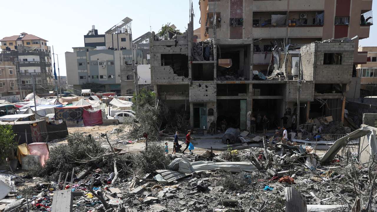 Aftermath of Israeli strikes at the area where Israeli hostages were rescued on Saturday, in Nuseirat refugee camp