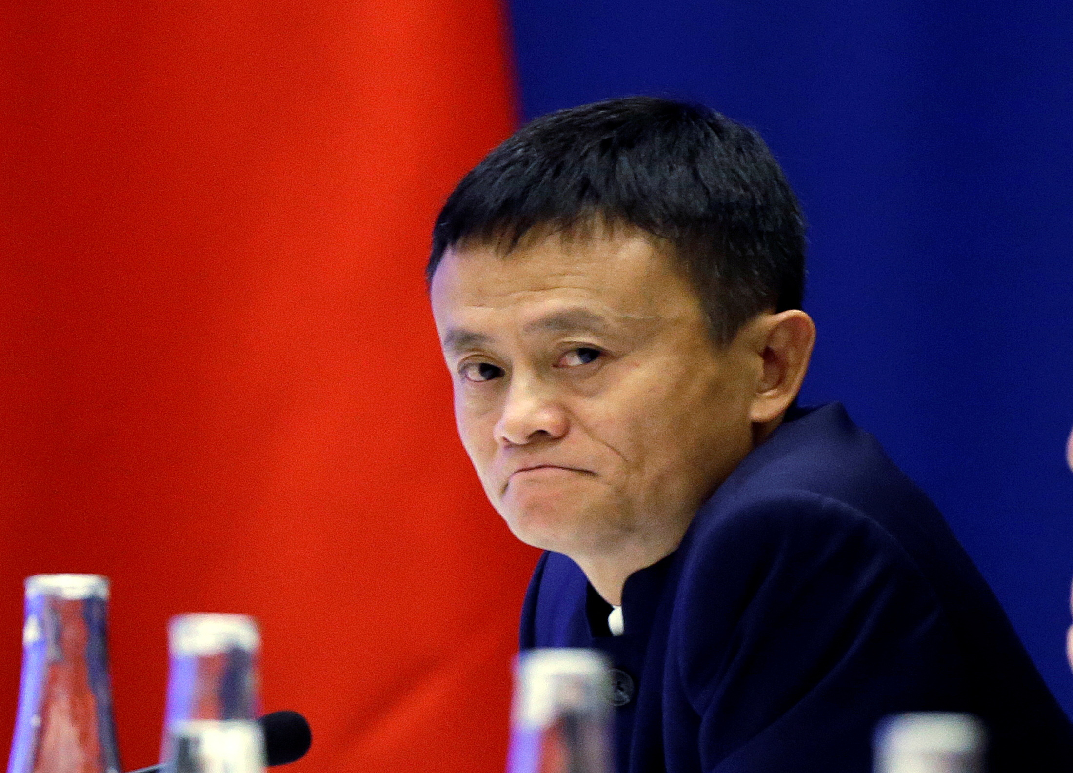 FILE PHOTO: Chinese CEO Jack Ma of Alibaba listens to Chinese President Xi Jinping at a U.S.-China business roundtable comprised of U.S. and Chinese CEOs in Seattle Washington