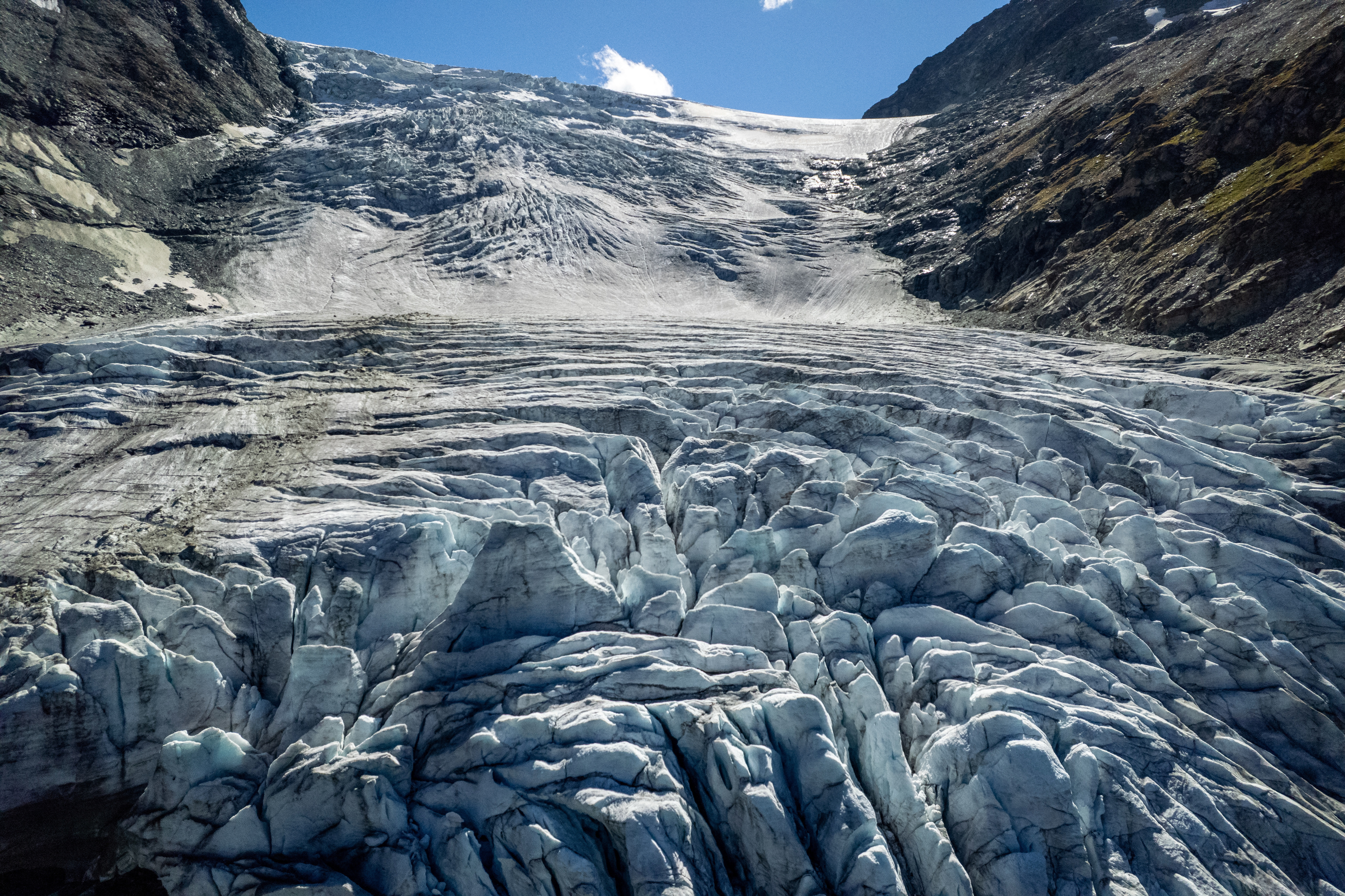 A drone view shows the Turtmann glacier on a warm summer day in Turtmann