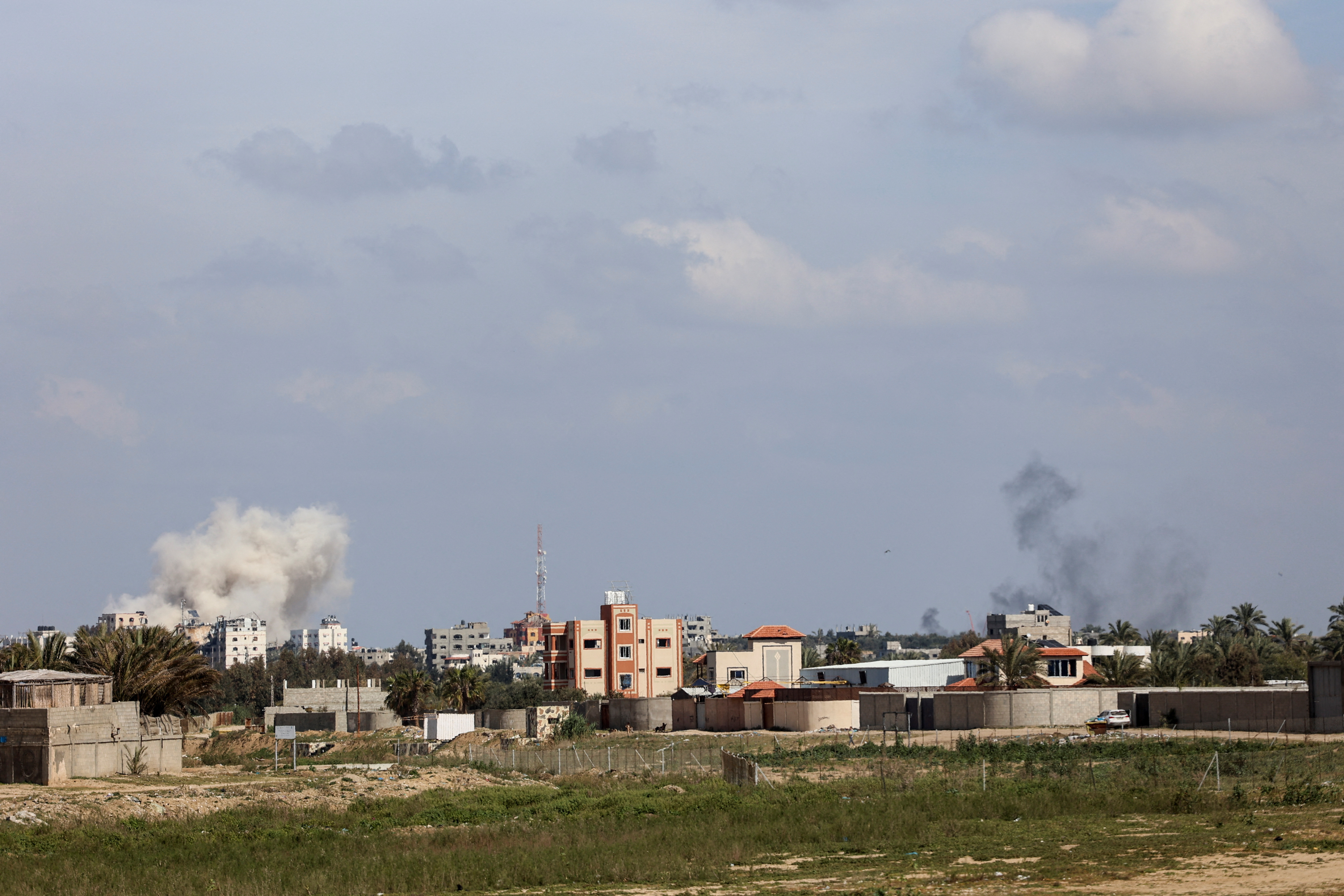 Smoke rises following an Israeli strike in the central Gaza Strip