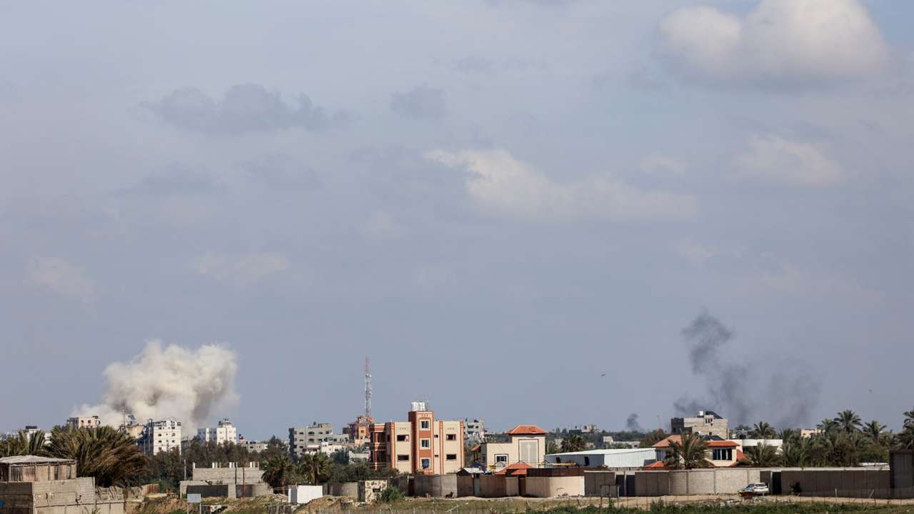 Smoke rises following an Israeli strike in the central Gaza Strip