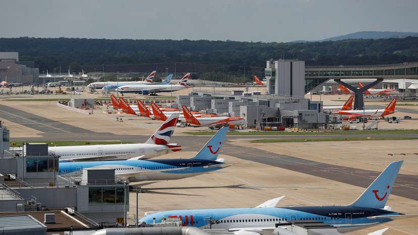 British Airways, Easyjet and TUI aircraft are parked at the South Terminal at Gatwick Airport, in Crawley