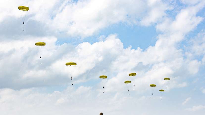 FILE PHOTO: Paratroopers jump into Normandy to pay tribute to the soldiers who parachuted in on D-Day in Sannerville, Normandy