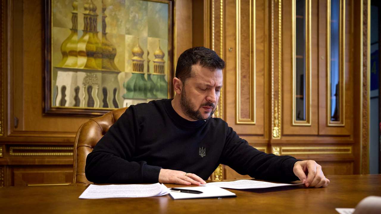 FILE PHOTO: Ukraine's President Zelenskiy speaks with U.S. House Speaker Johnson via phone line in Kyiv