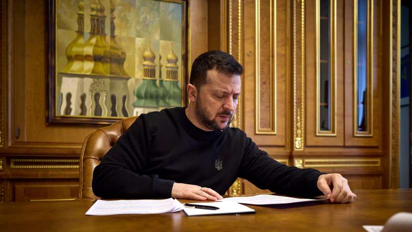 FILE PHOTO: Ukraine's President Zelenskiy speaks with U.S. House Speaker Johnson via phone line in Kyiv