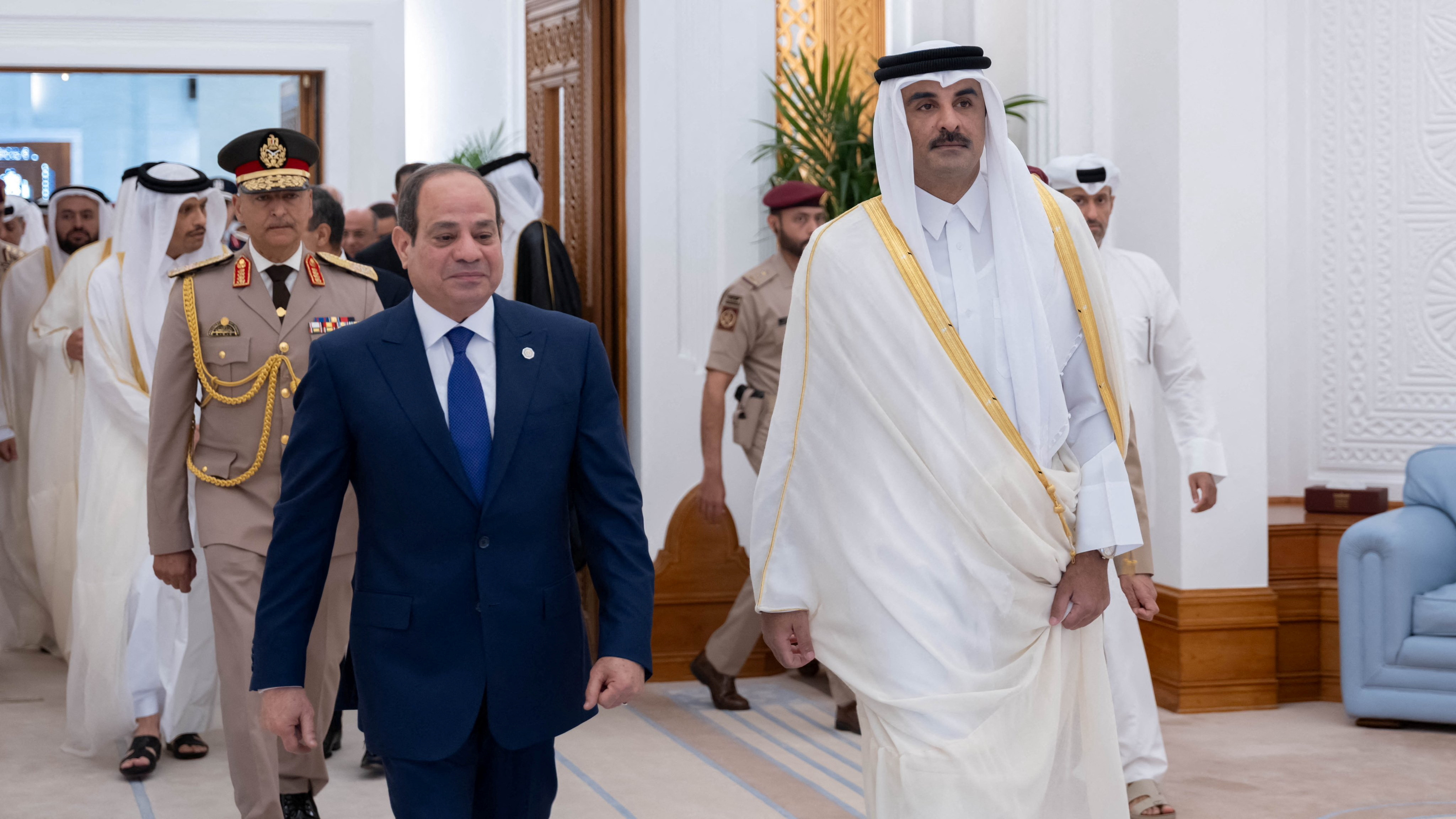 Qatar's Emir Sheikh Tamim Bin Hamad Al Thani meets with Egypt's President Abdel Fattah al-Sisi, in Doha