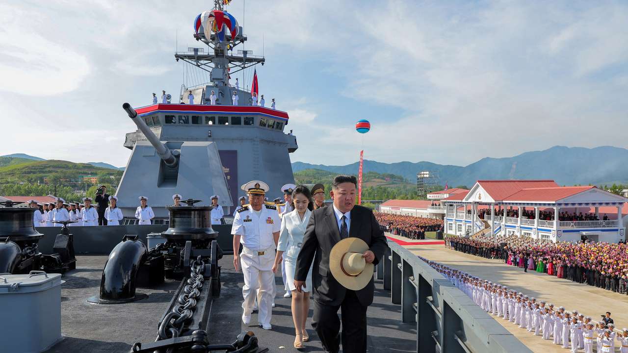 North Korean leader Kim Jong Un attends the launching ceremony of a warship that had been damaged upon its first attempt to launch