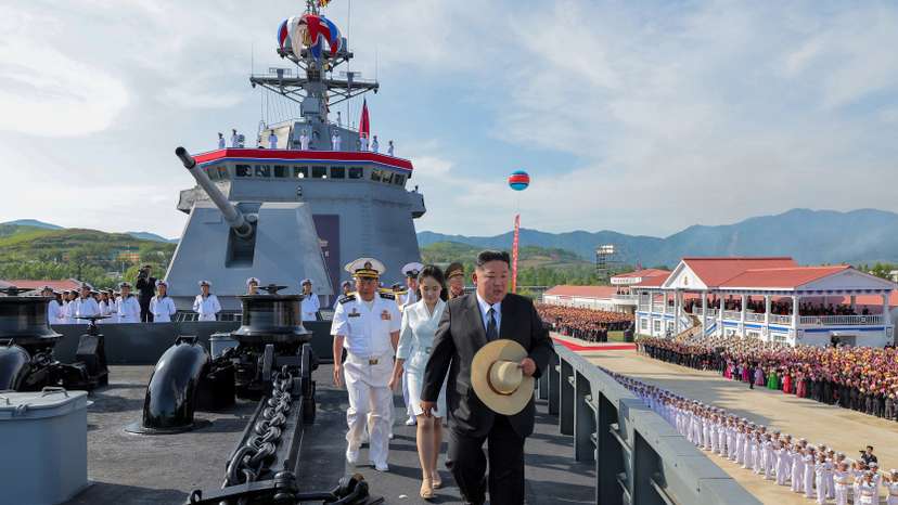 North Korean leader Kim Jong Un attends the launching ceremony of a warship that had been damaged upon its first attempt to launch