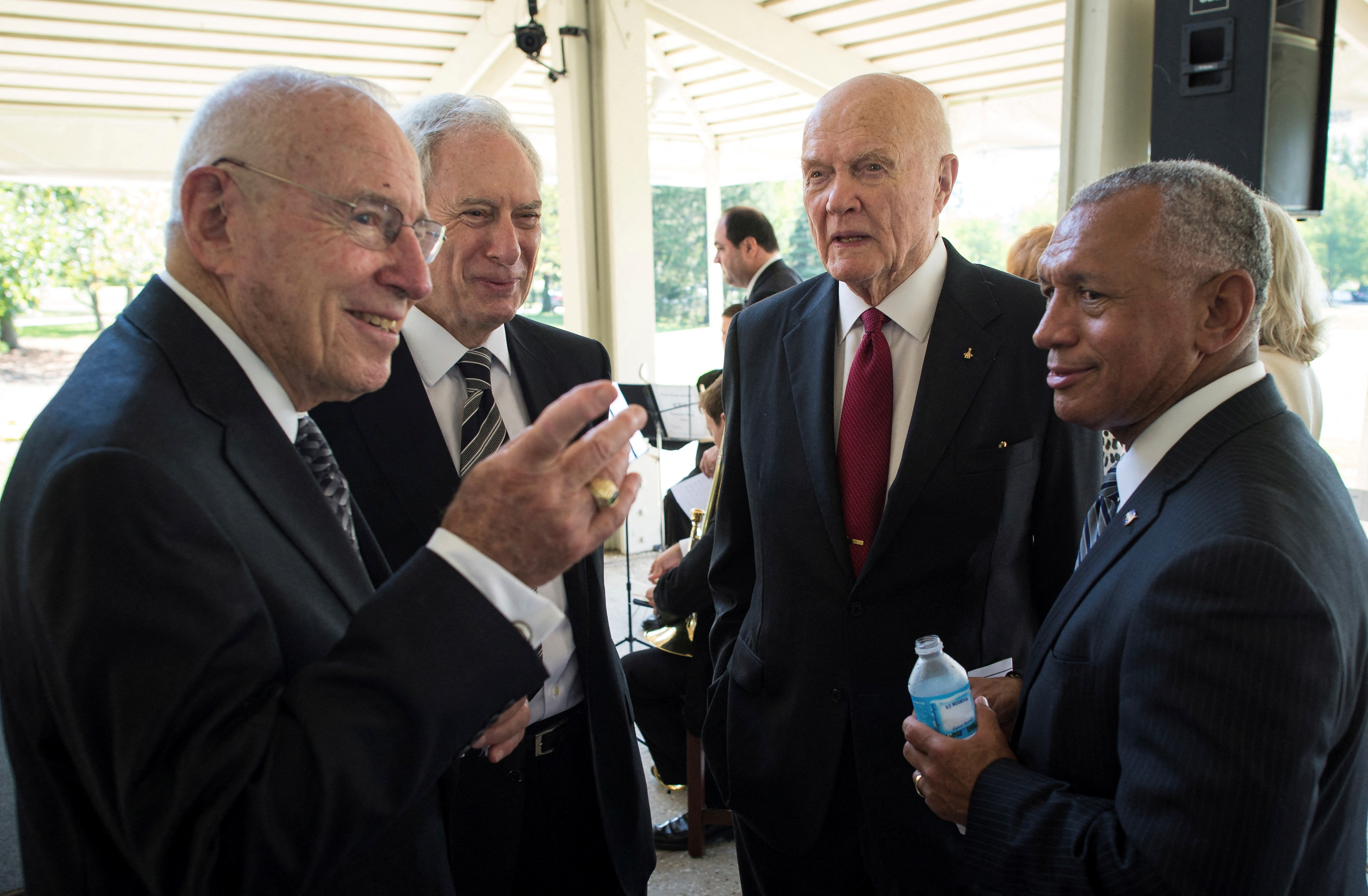 FILE PHOTO: Handout of Apollo 13 astronaut Lovell, former NASA Administrator Goldin, Sen. Glenn and NASA Administrator Bolden talk at a private memorial service celebrating the life of Neil Armstrong at the Camargo Club in Cincinnati, Ohio
