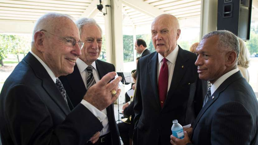 FILE PHOTO: Handout of Apollo 13 astronaut Lovell, former NASA Administrator Goldin, Sen. Glenn and NASA Administrator Bolden talk at a private memorial service celebrating the life of Neil Armstrong at the Camargo Club in Cincinnati, Ohio