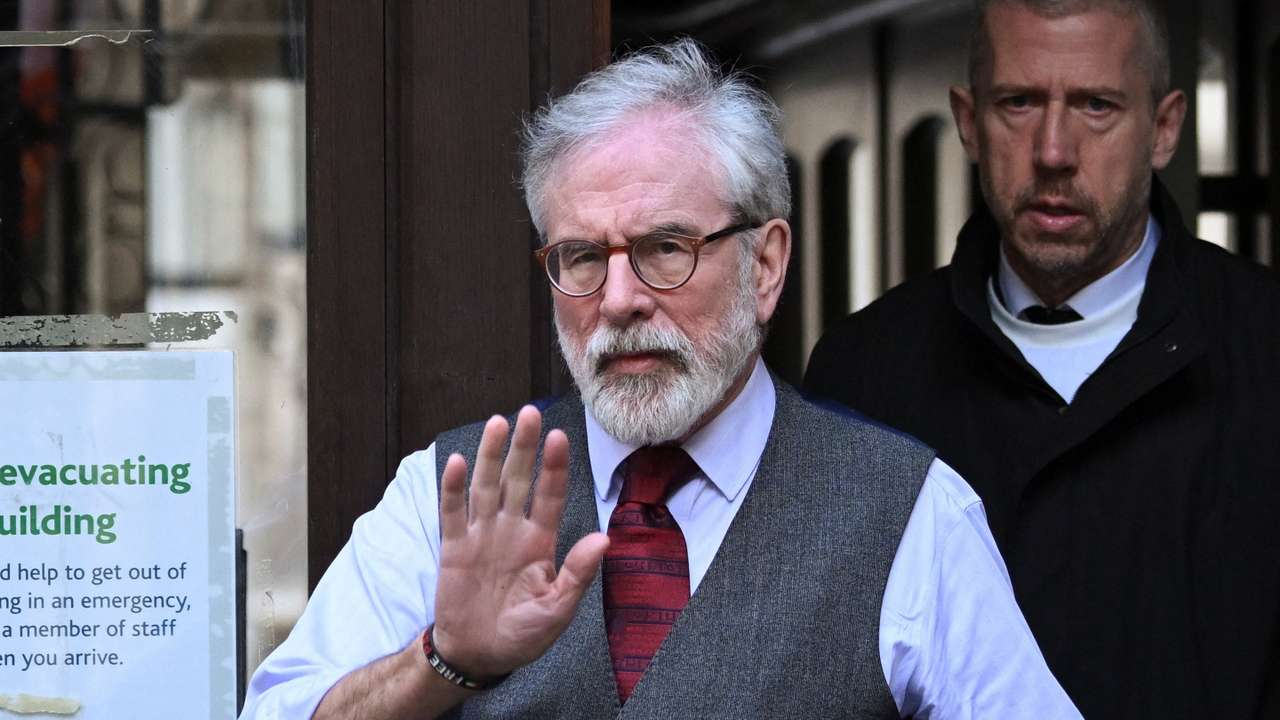 Former Sinn Fein president Gerry Adams walks outside the High Court, in London