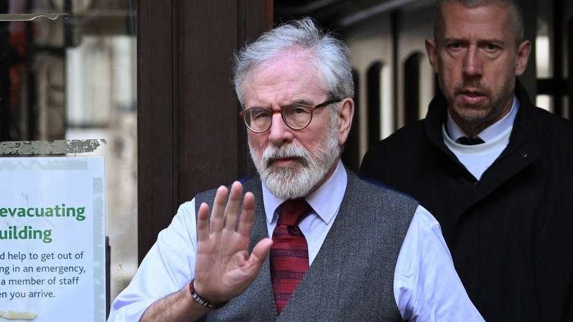 Former Sinn Fein president Gerry Adams walks outside the High Court, in London