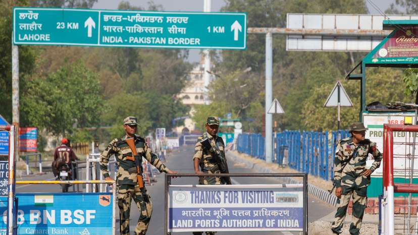 Border Security Force (BSF) security personnel stand guard at the Attari-Wagah crossing on the India-Pakistan border in Amritsar