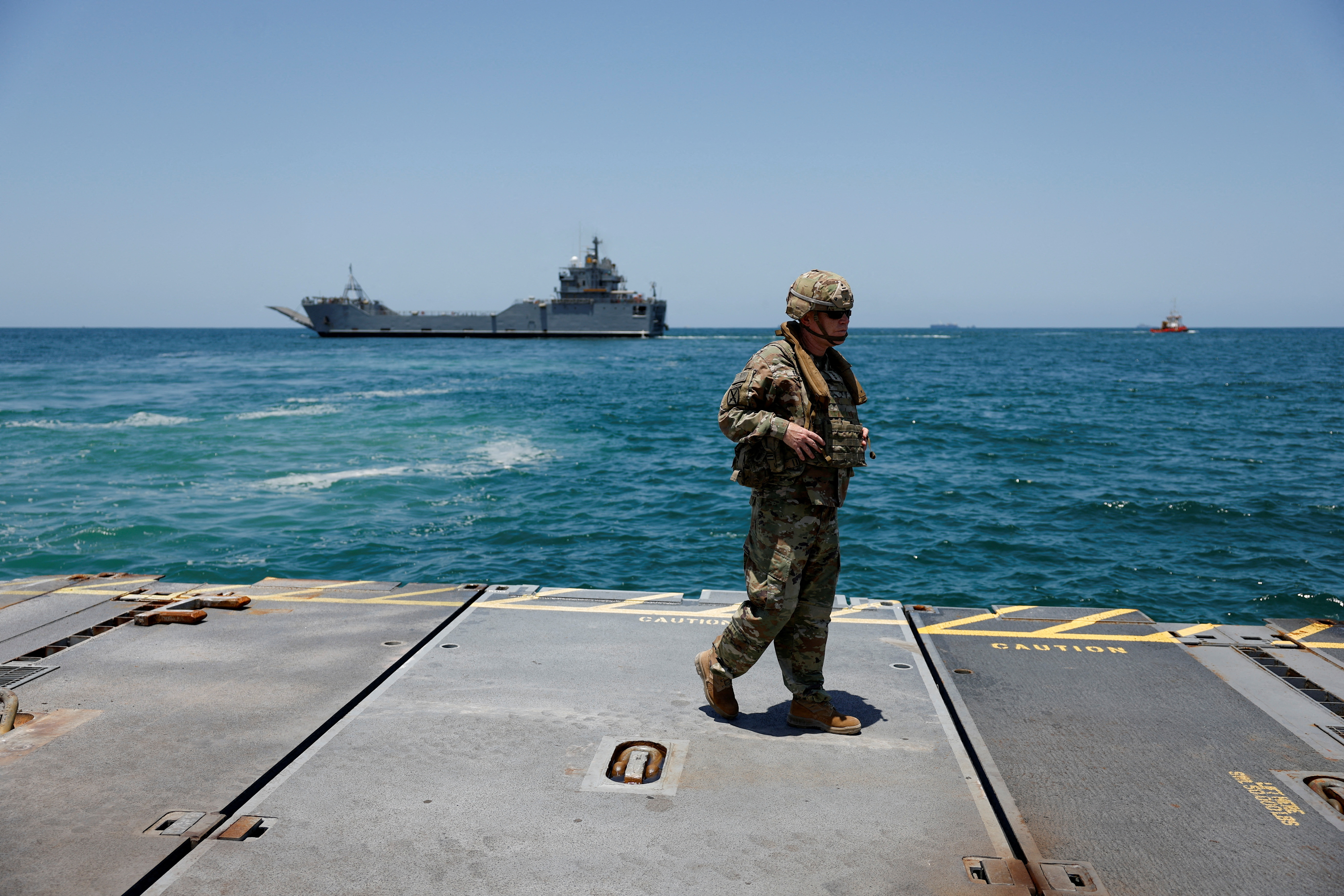 FILE PHOTO: Soldiers stand at Trident Pier