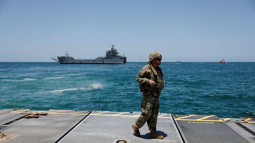 FILE PHOTO: Soldiers stand at Trident Pier