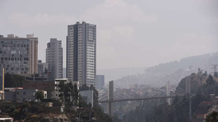 A smoky shroud from wildfires engulfs La Paz