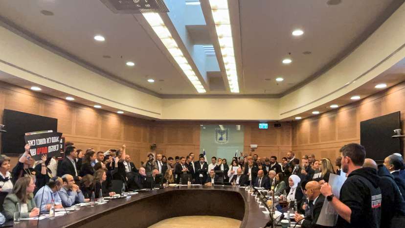 Relatives of Israelis who have been held hostage by Hamas militants since October 7, storm a parliamentary committee session demanding that the lawmakers do more to try to free their loved ones, in Jerusalem