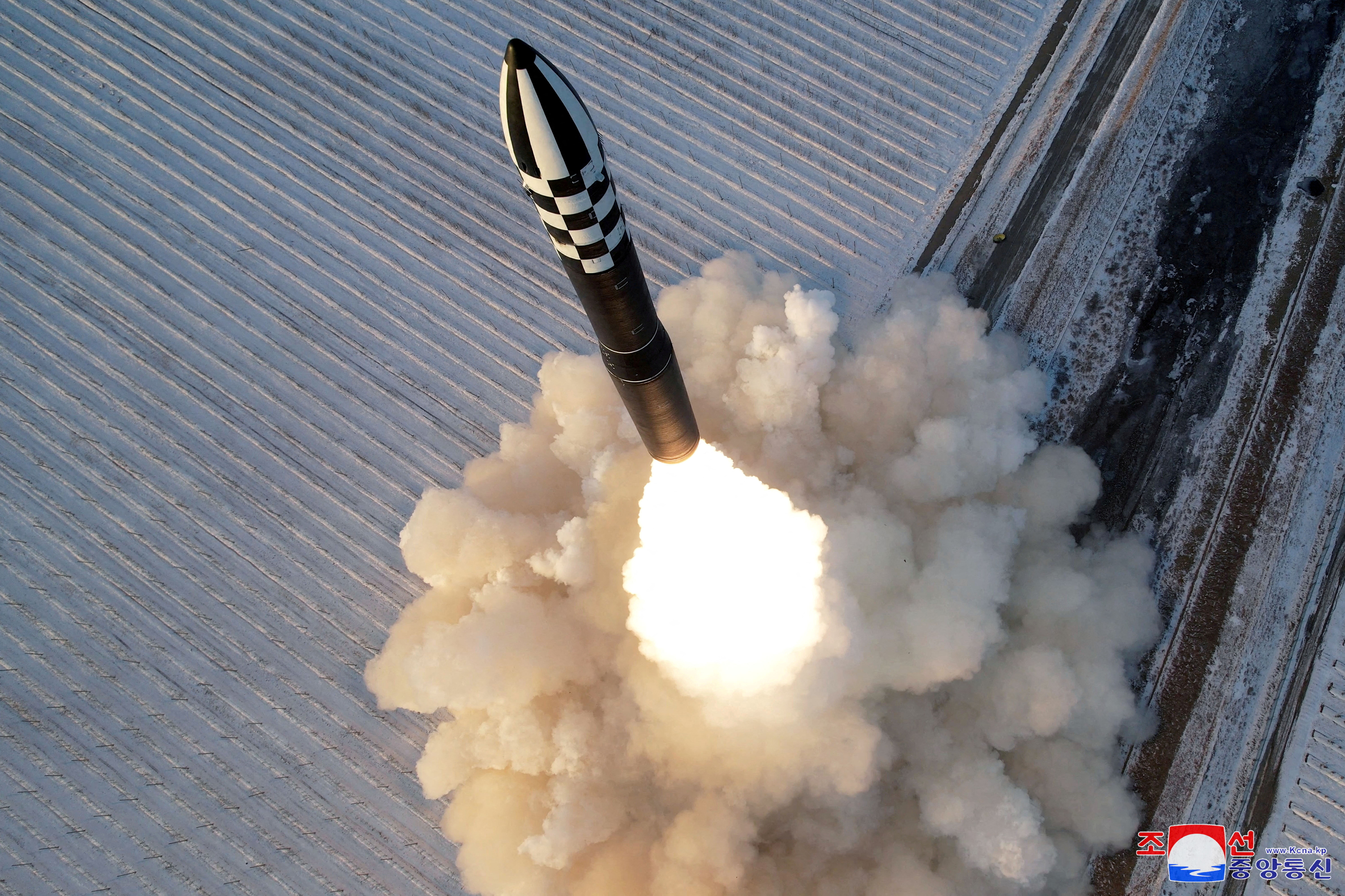 FILE PHOTO: A Hwasong-18 intercontinental ballistic missile is launched during a drill