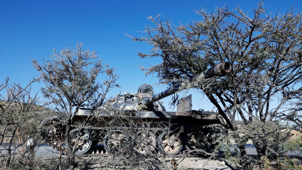 FILE PHOTO: A damaged Eritrean military tank is seen near the town of Wikro