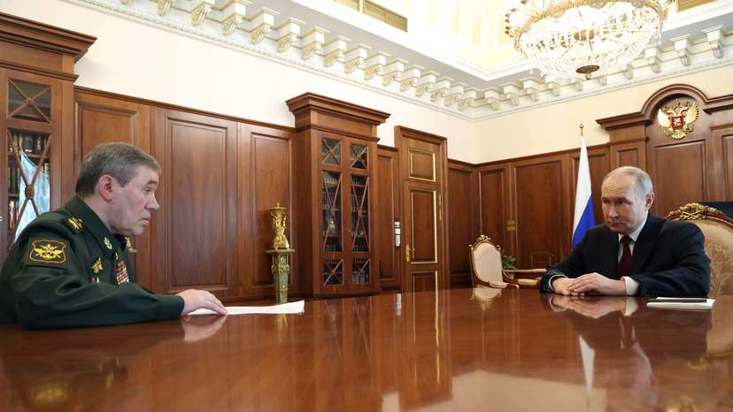 Russian President Vladimir Putin meets with Chief of the General Staff Valery Gerasimov in Moscow