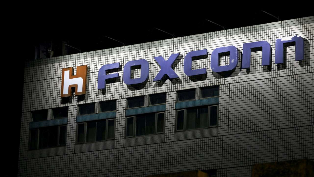 FILE PHOTO: The logo of Foxconn is seen outside a company's building in Taipei